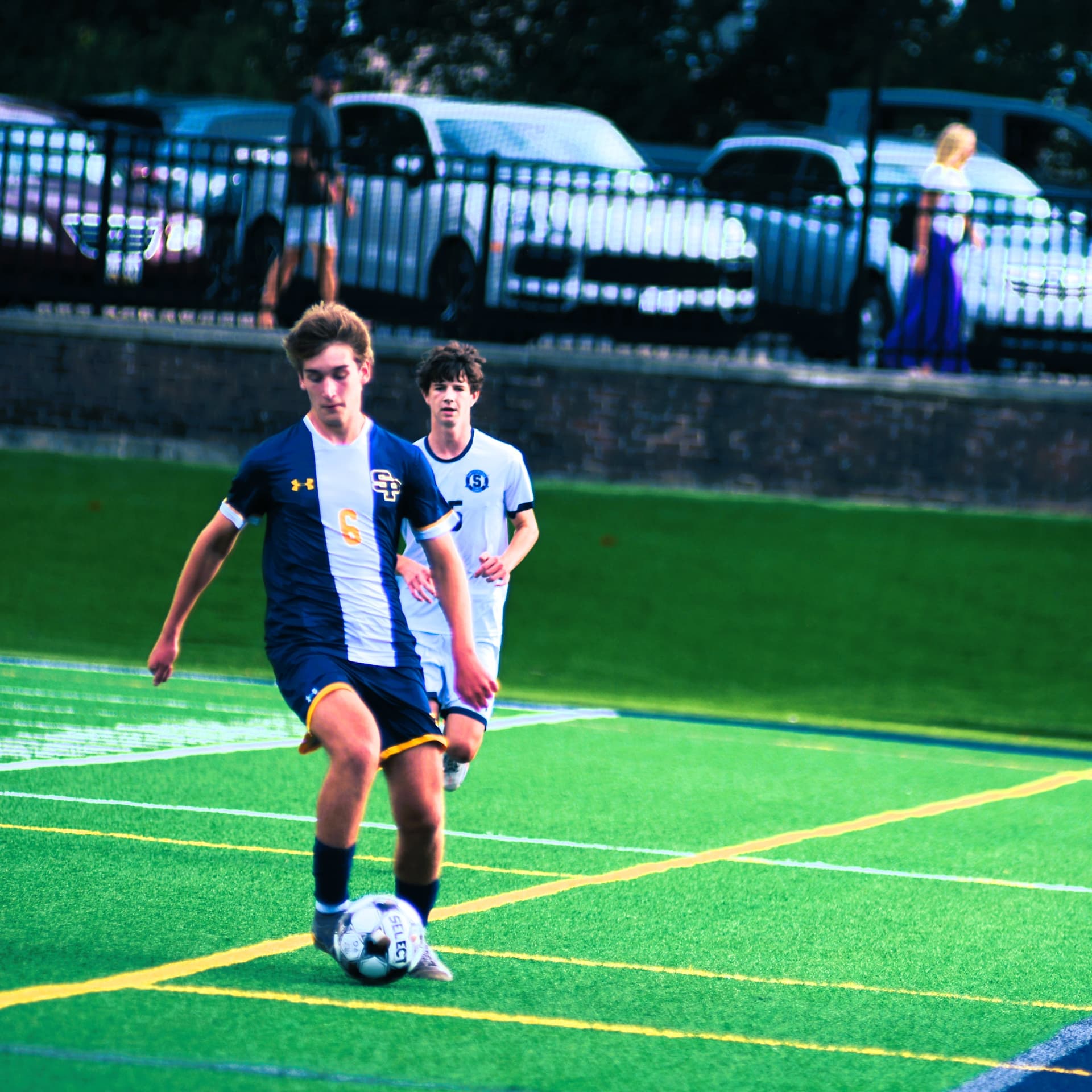 St. Paul's number 6 dribbles up the sideline