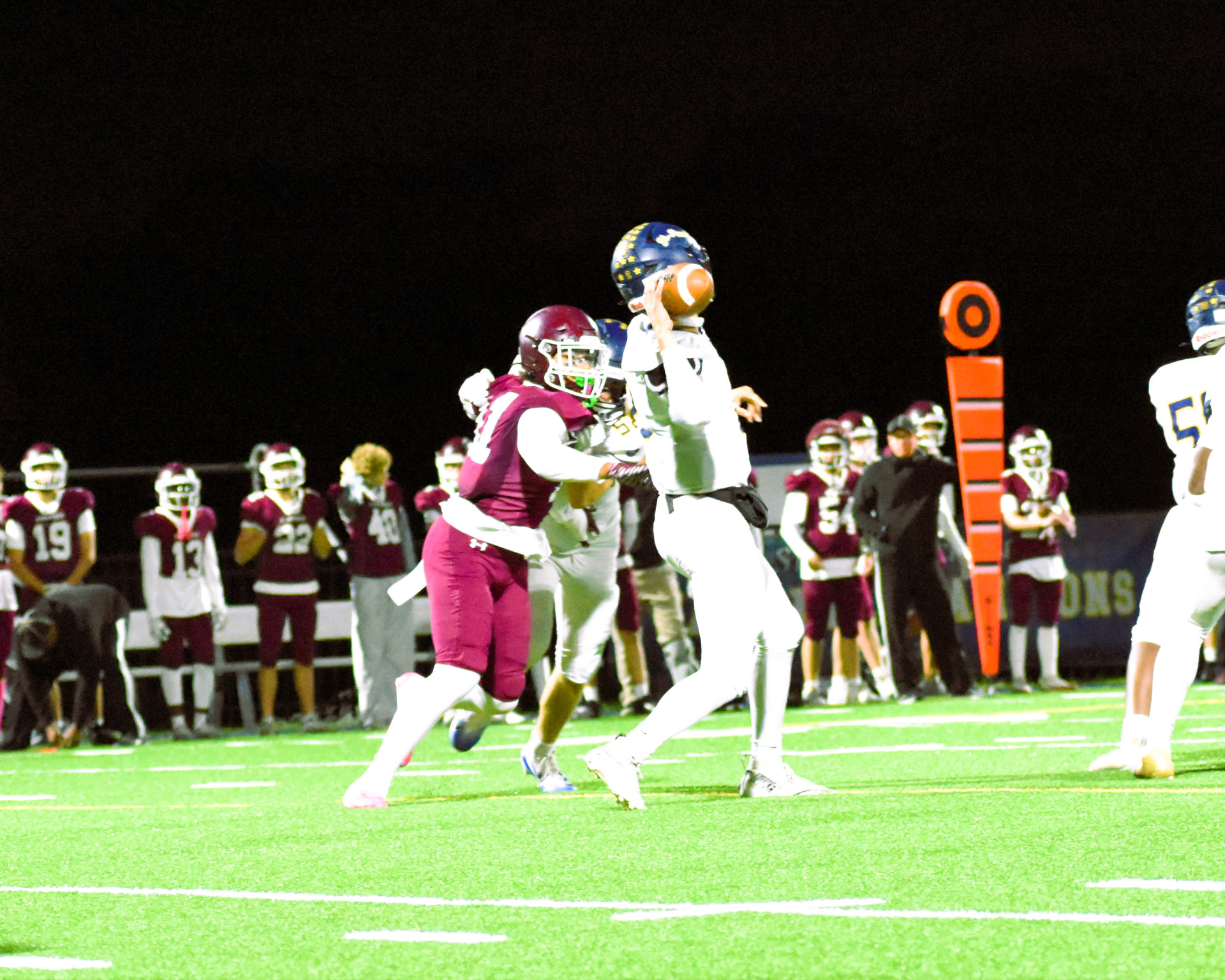 SP quarterback throws under pressure