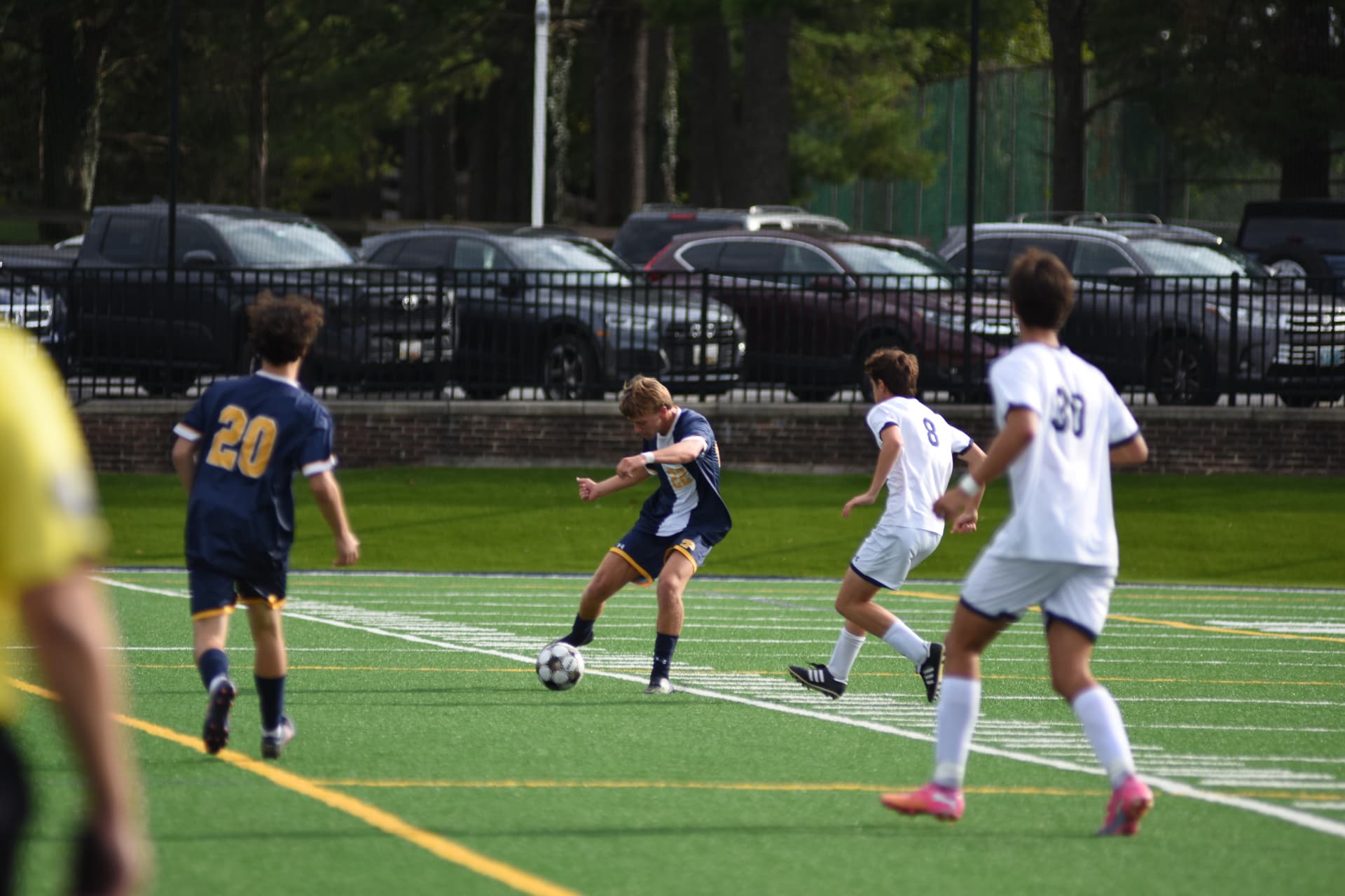 St. Paul's number 22 strikes the ball