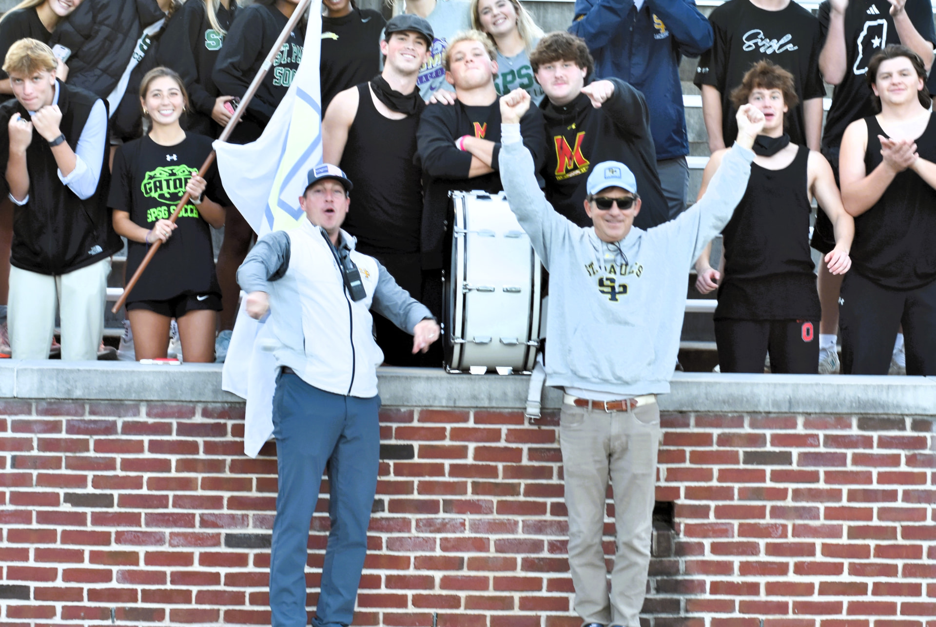 Student section cheers from the stands