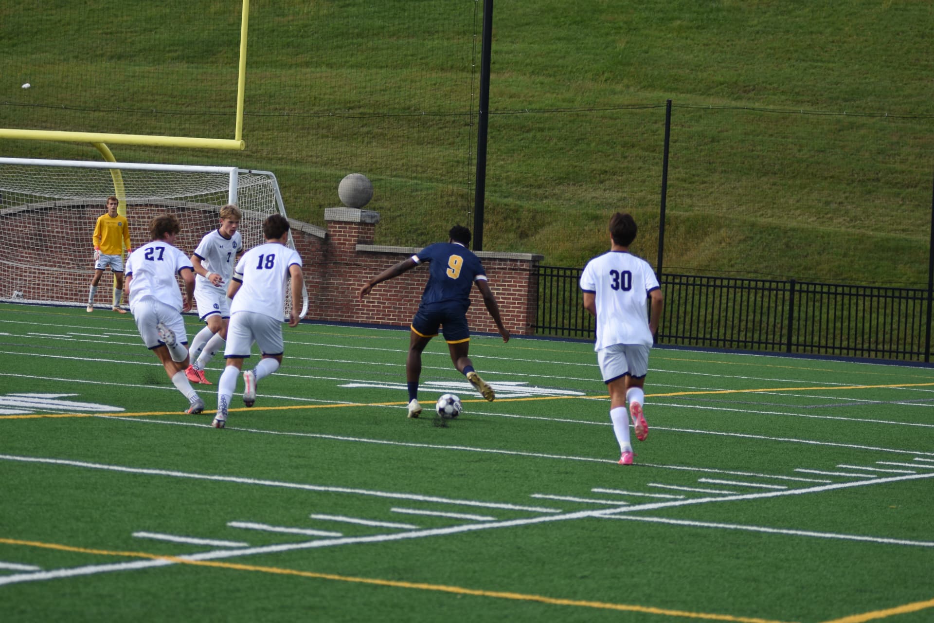 St. Paul's number 9 takes on four StP&P defenders