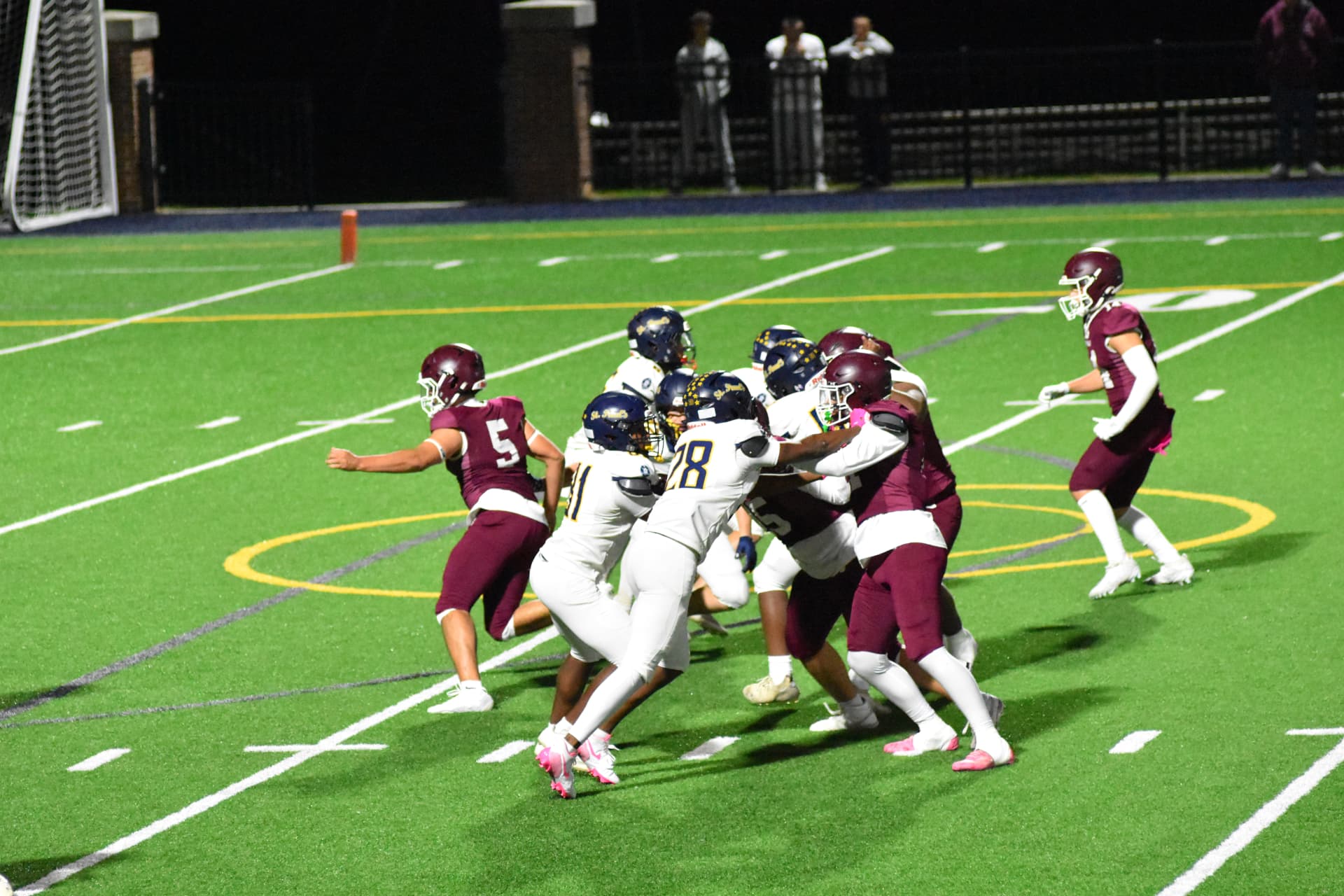 Linemen battle at the line of scrimmage