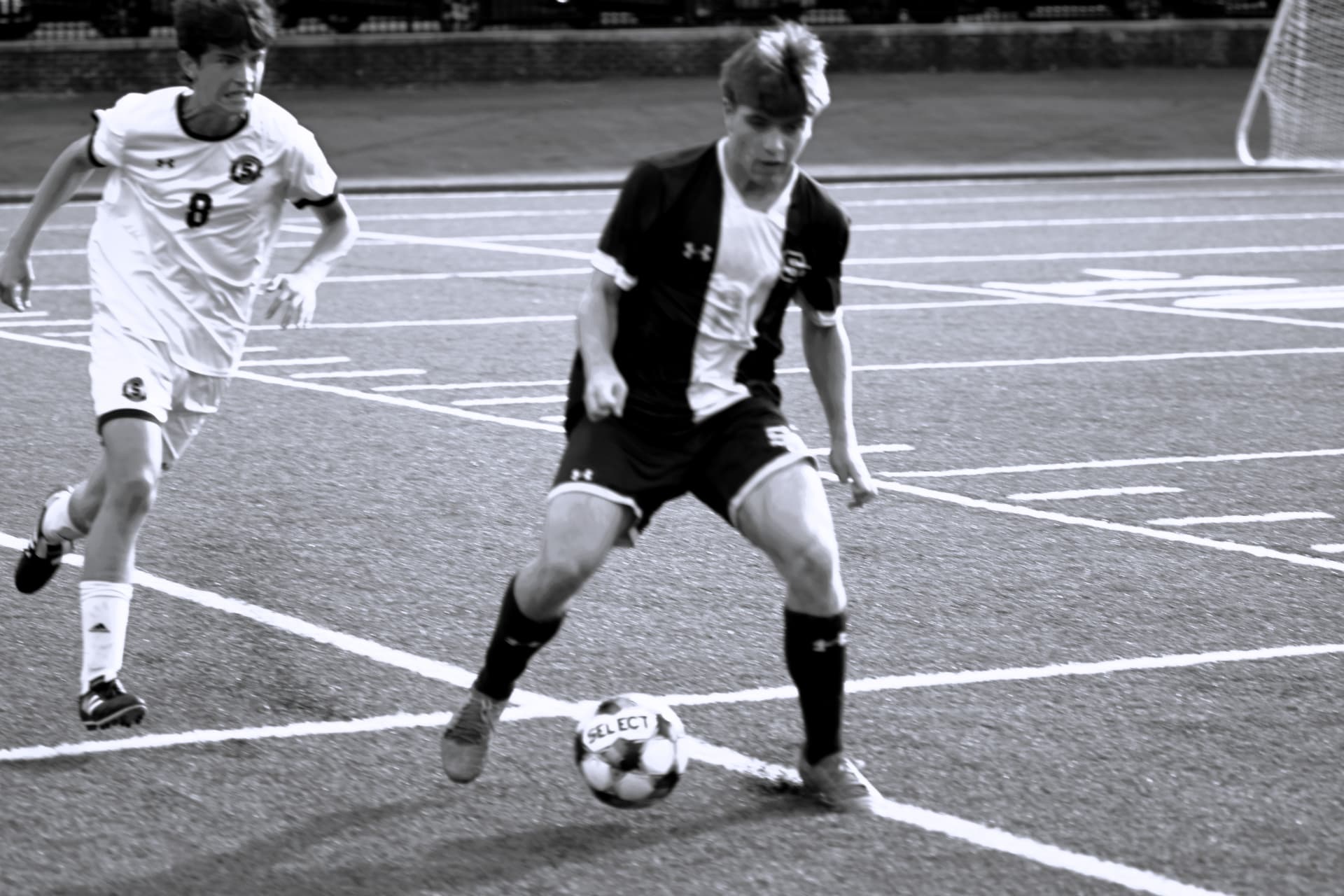 St. Paul's player controls the ball under pressure
