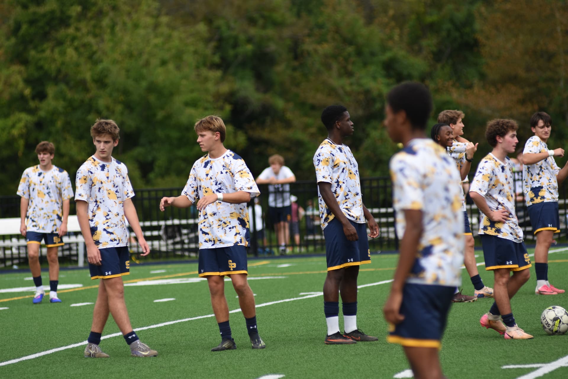 St. Paul's soccer team warms up on the field