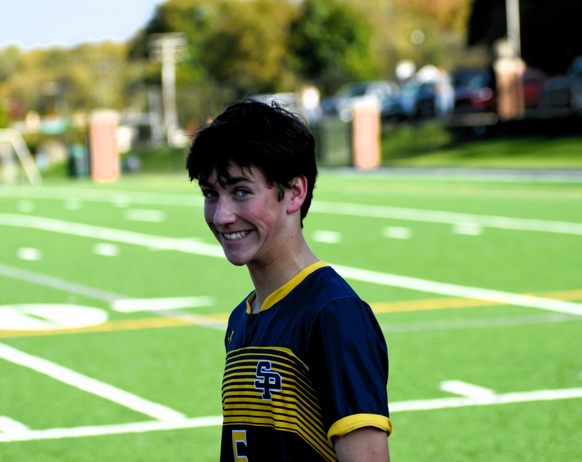 JV Crusaders number 5 smiles on the sideline
