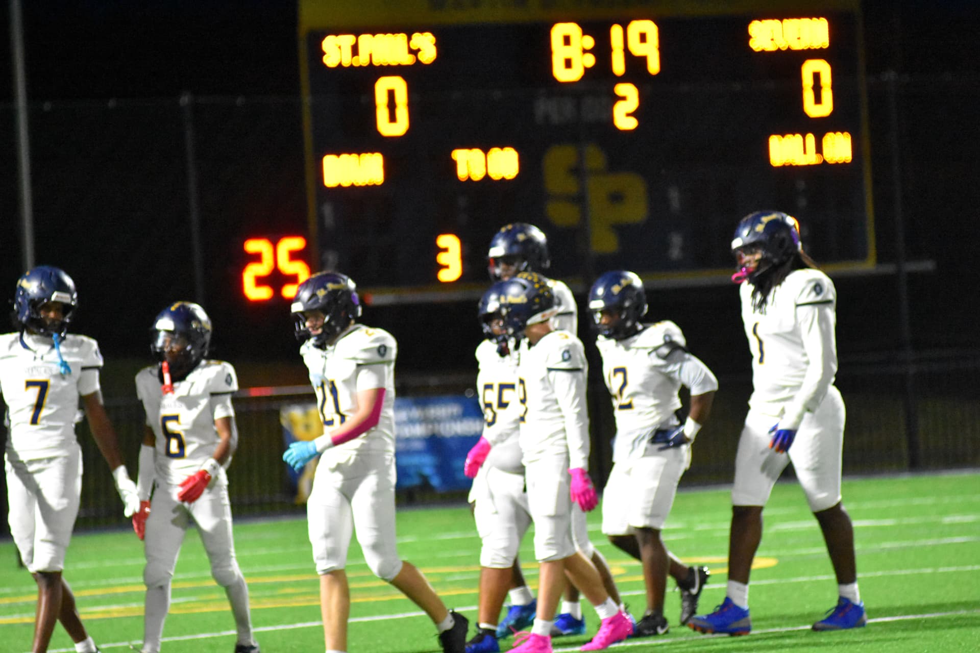 Crusaders walk past the scoreboard, St. Paul's 0, Severn 0