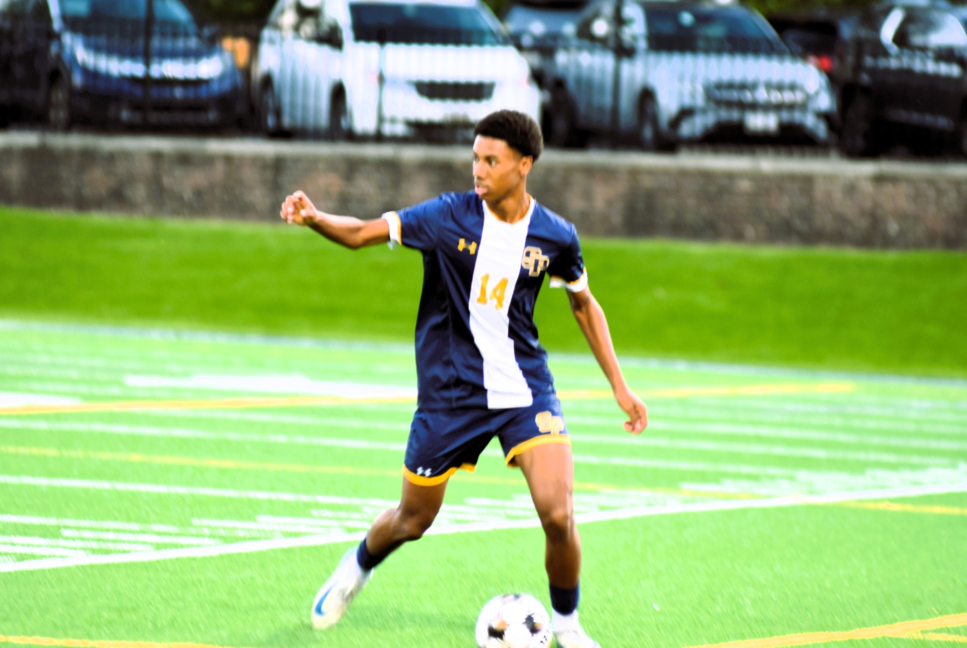 SP number 14 directs play with the ball at his feet
