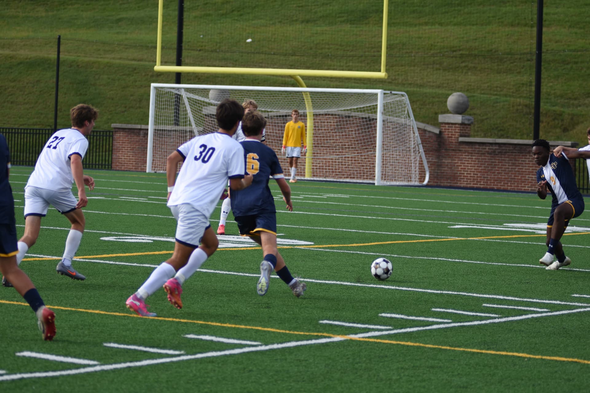 St. Paul's number 6 drives toward the StP&P goal