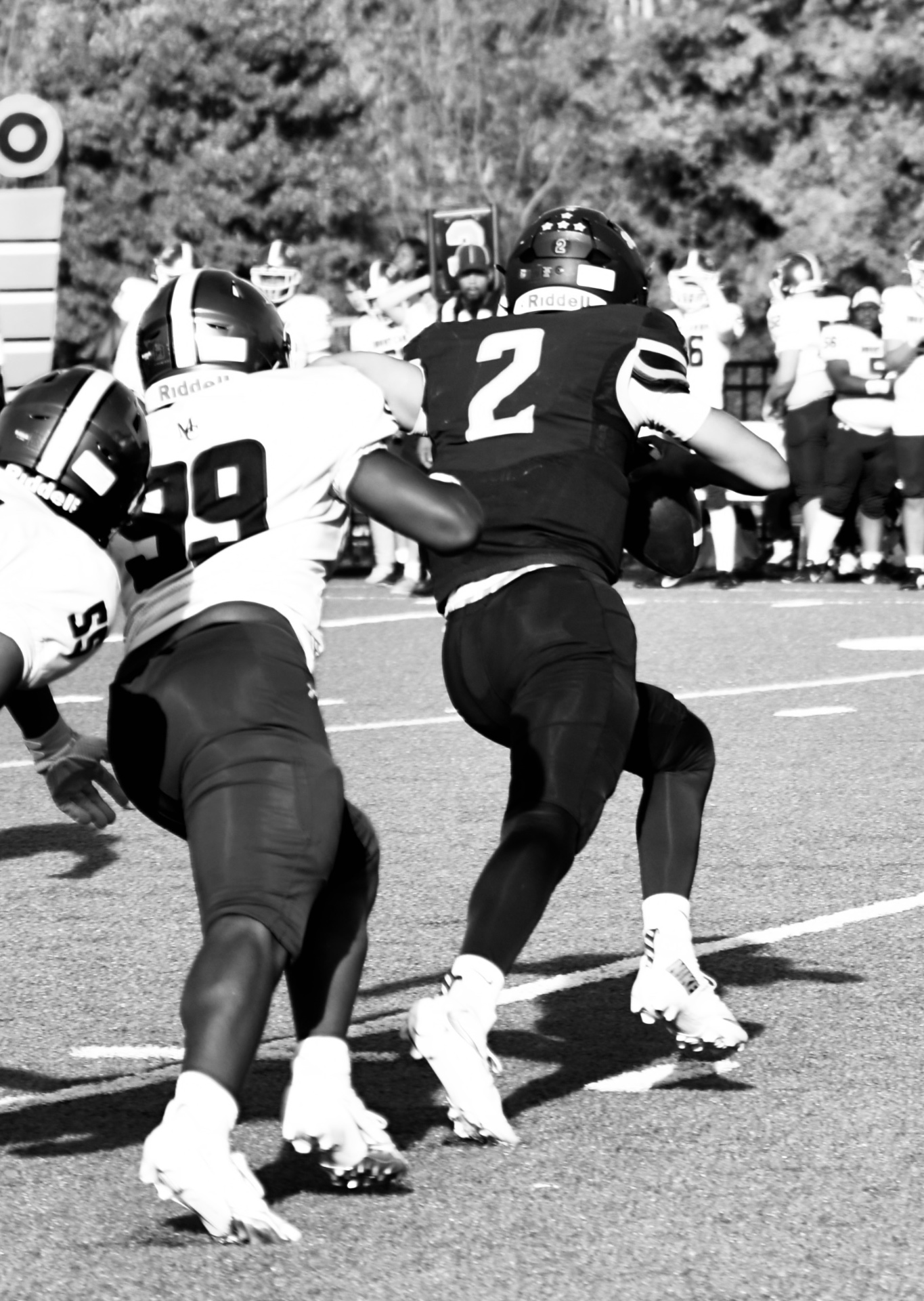#2 breaking a tackle, black and white