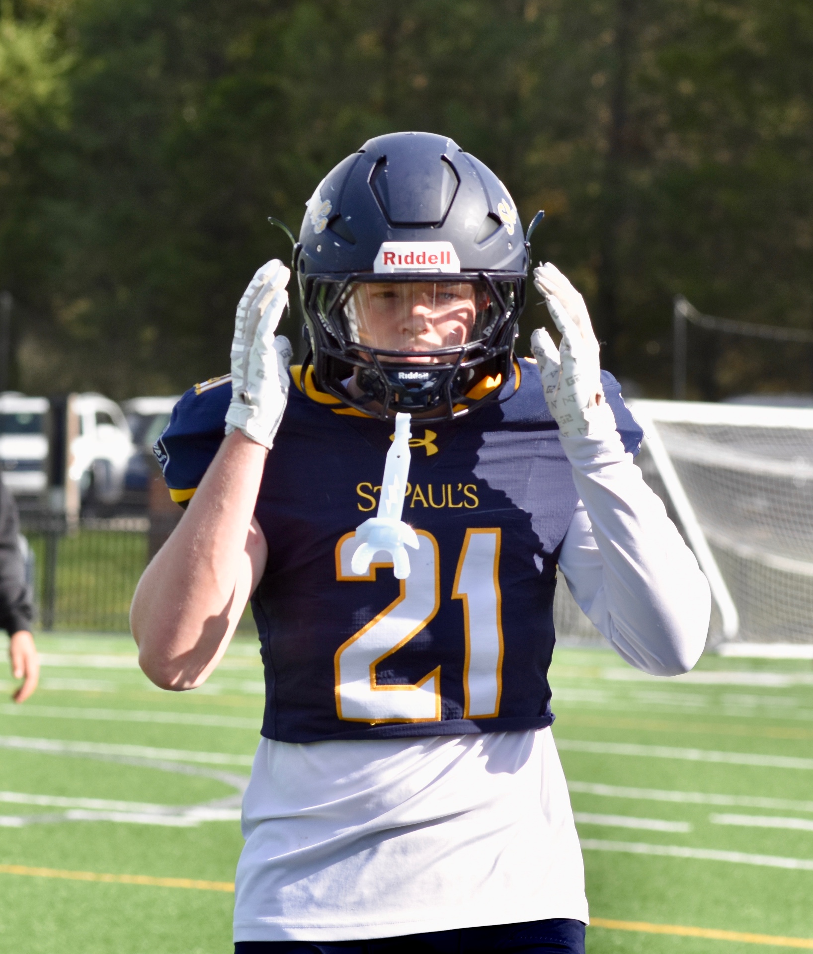 #21 adjusting his helmet