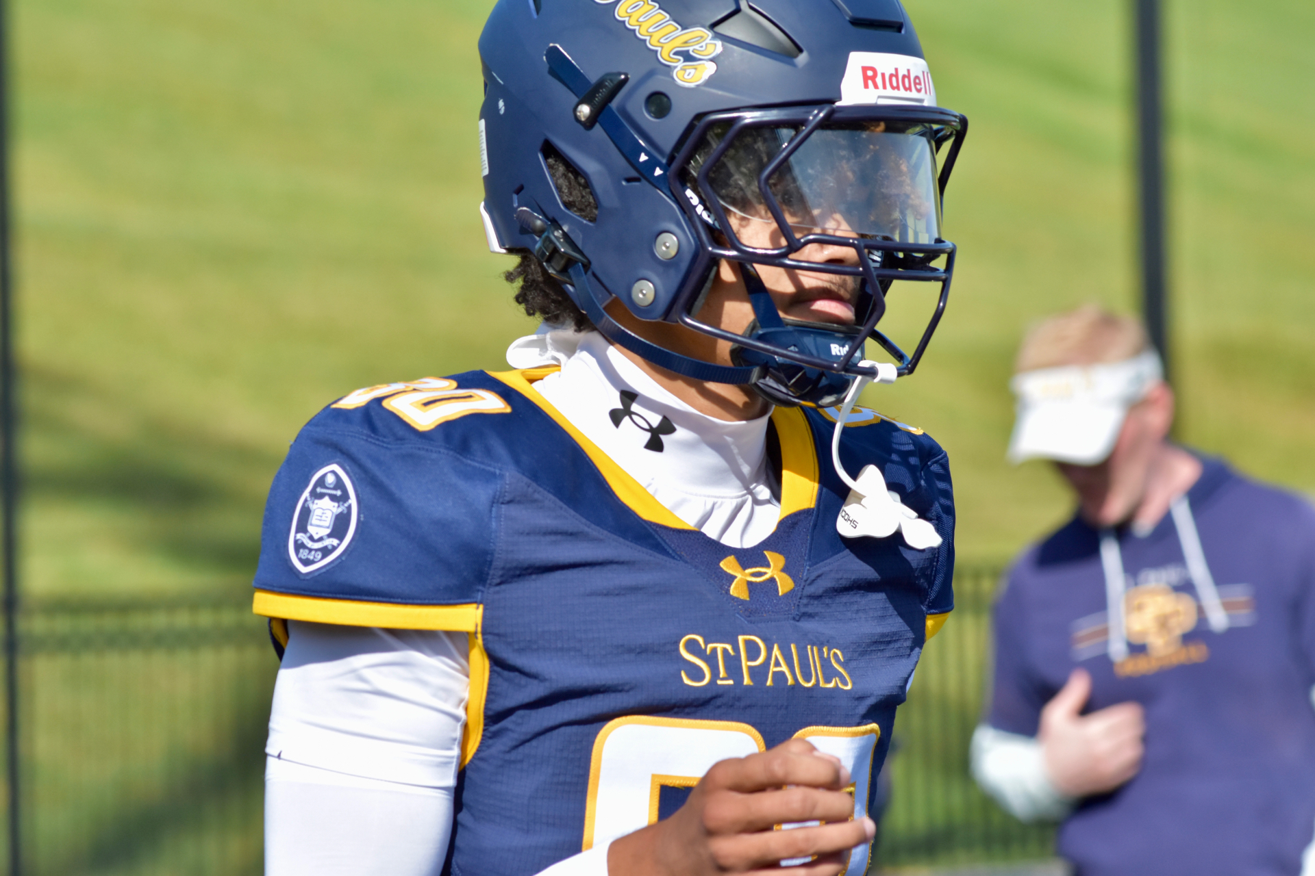 #80 in his helmet on the sideline