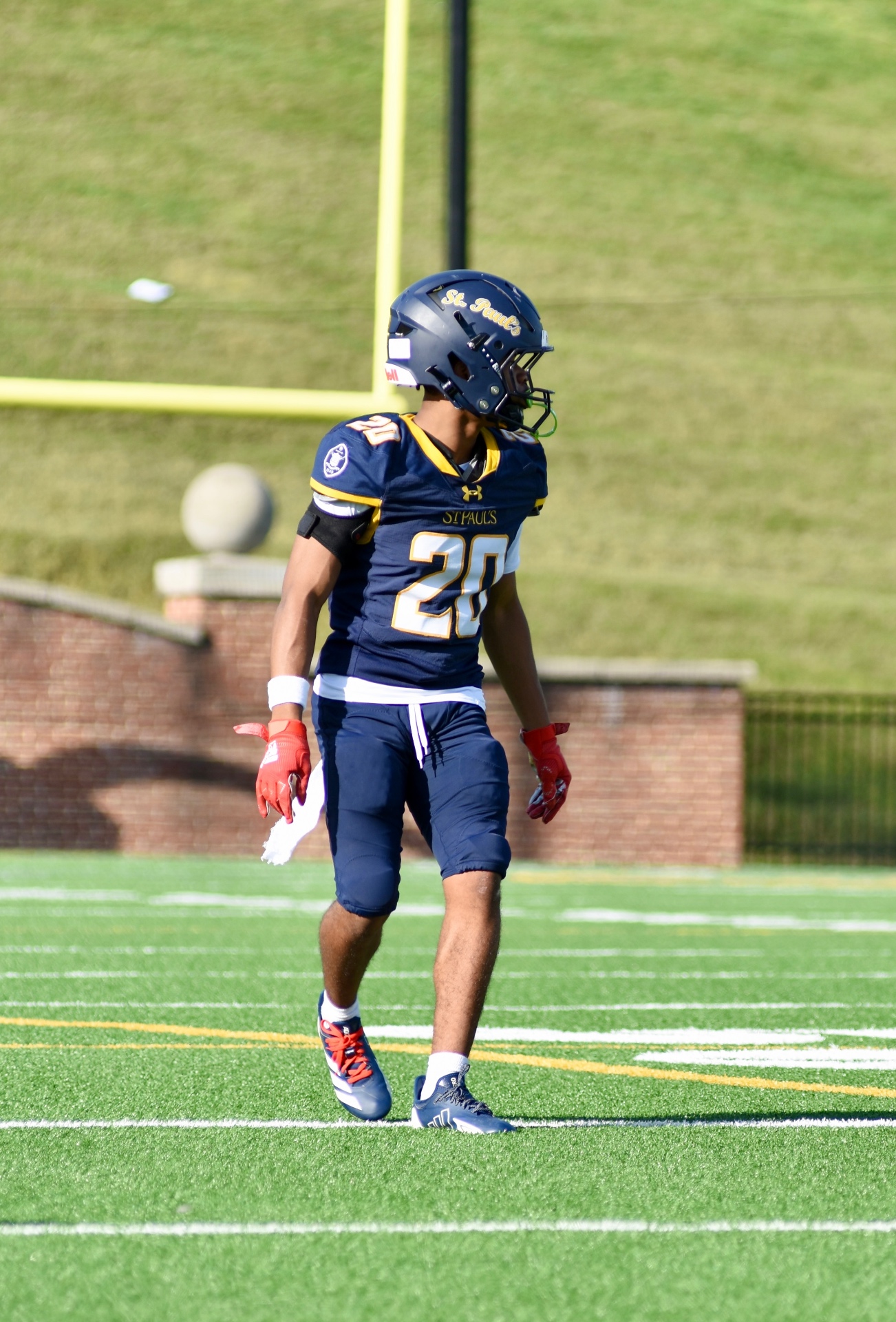 #20 lined up near the goal post